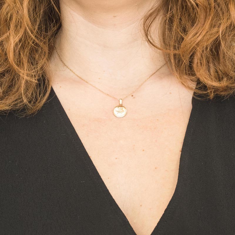 Golden girl and mother-of-pearl pendant