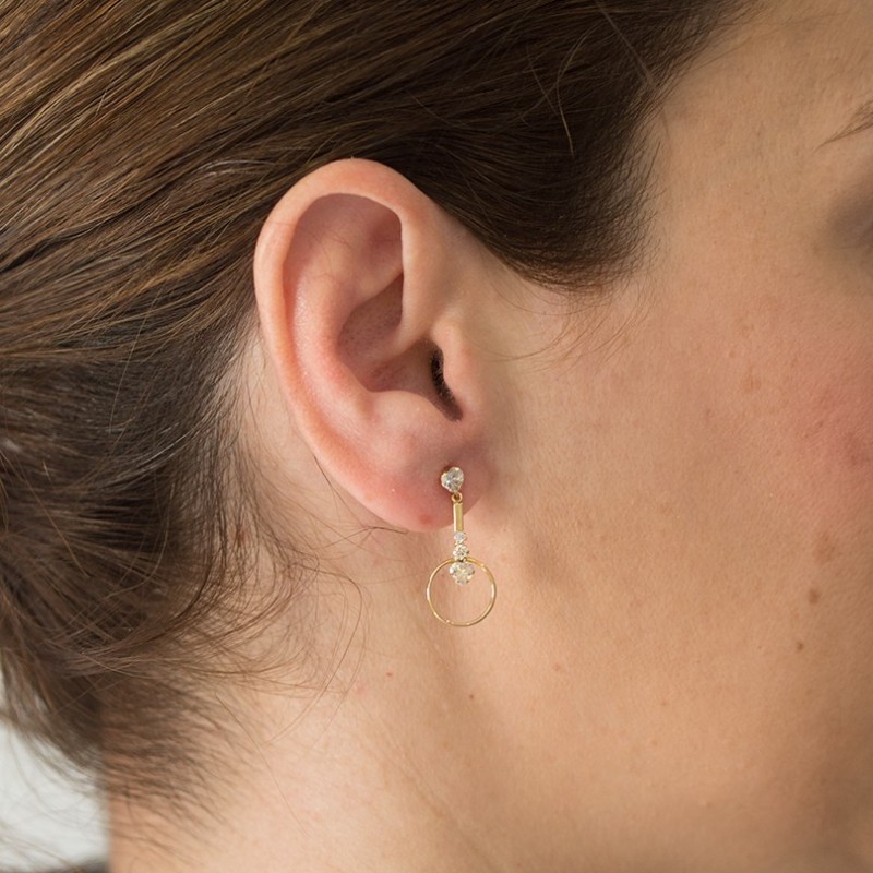 Heart-shaped gold earring