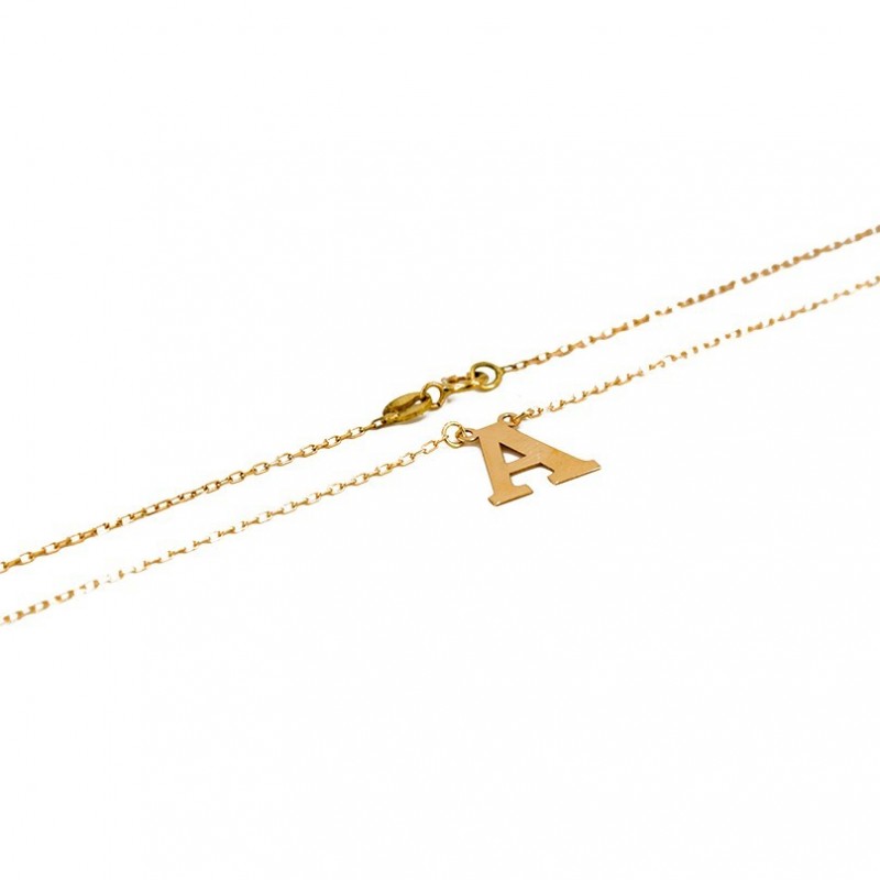 Pendant with initial in gold