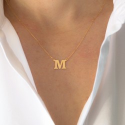 Necklace with initial in gold