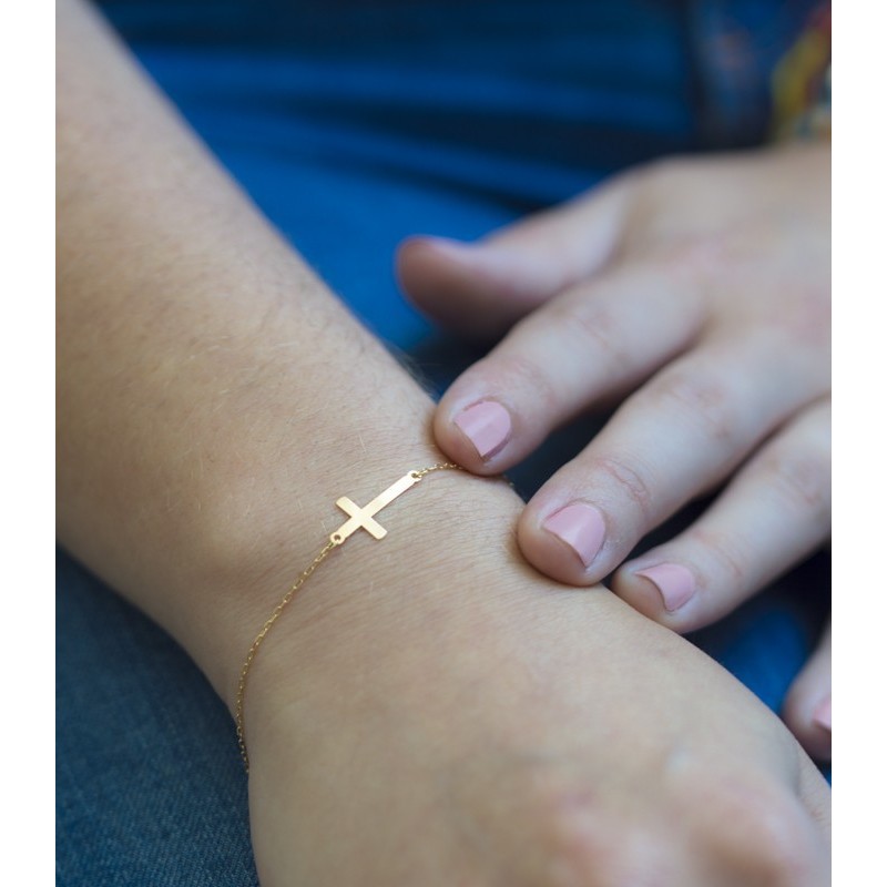 Adjustable cross gold bracelet