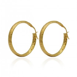 Gold hoop earrings with...