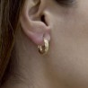 Gold hoop earrings with fret design