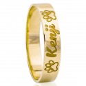 Gold wedding ring with exterior engraving