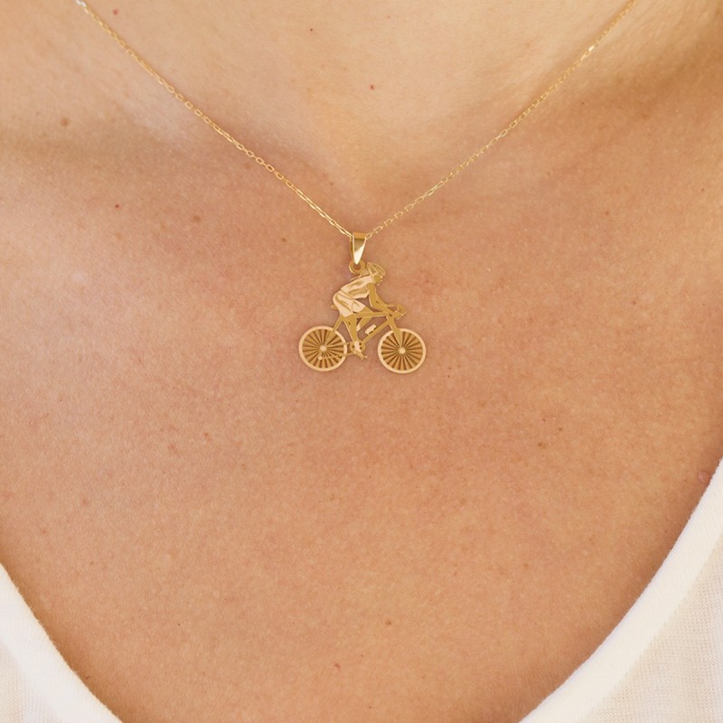 Pendentif femme cycliste